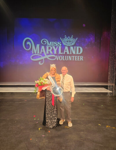 MFTI's Ron Leggett presented the Winner of the Miss Maryland Volunteer Teen pageant Bridget O'Brien with a red fur coat. Pageant was held in Frederick, Md on August 1st.