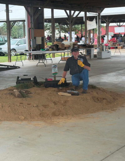 Mike Yancey owner of Pine Hollow Trapping Supplies From AR doing a coyote demo.